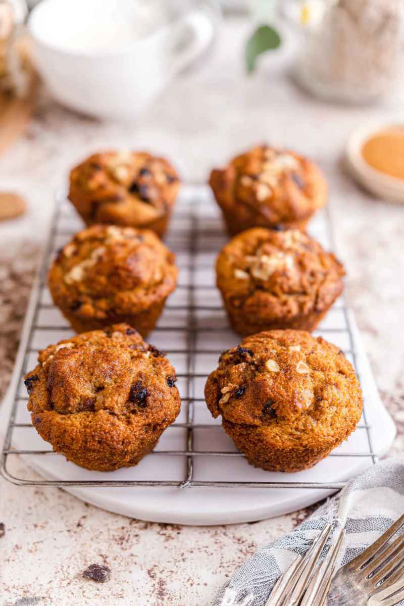Indulge in the classic Canadian flavor of butter tarts with these easy-to-make muffins! Packed with raisins, walnuts, and a gooey filling, they're perfect for breakfast or dessert. Serve warm for an irresistible treat. #MuffinMonday #ButterTartDelight